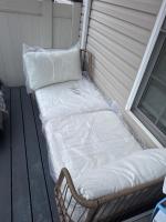 A lounge chair that is perfect for small courtyards.