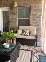Outdoor wicker daybed.