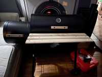 Add the 2 brackets to hold legs on before installing the bottom rack