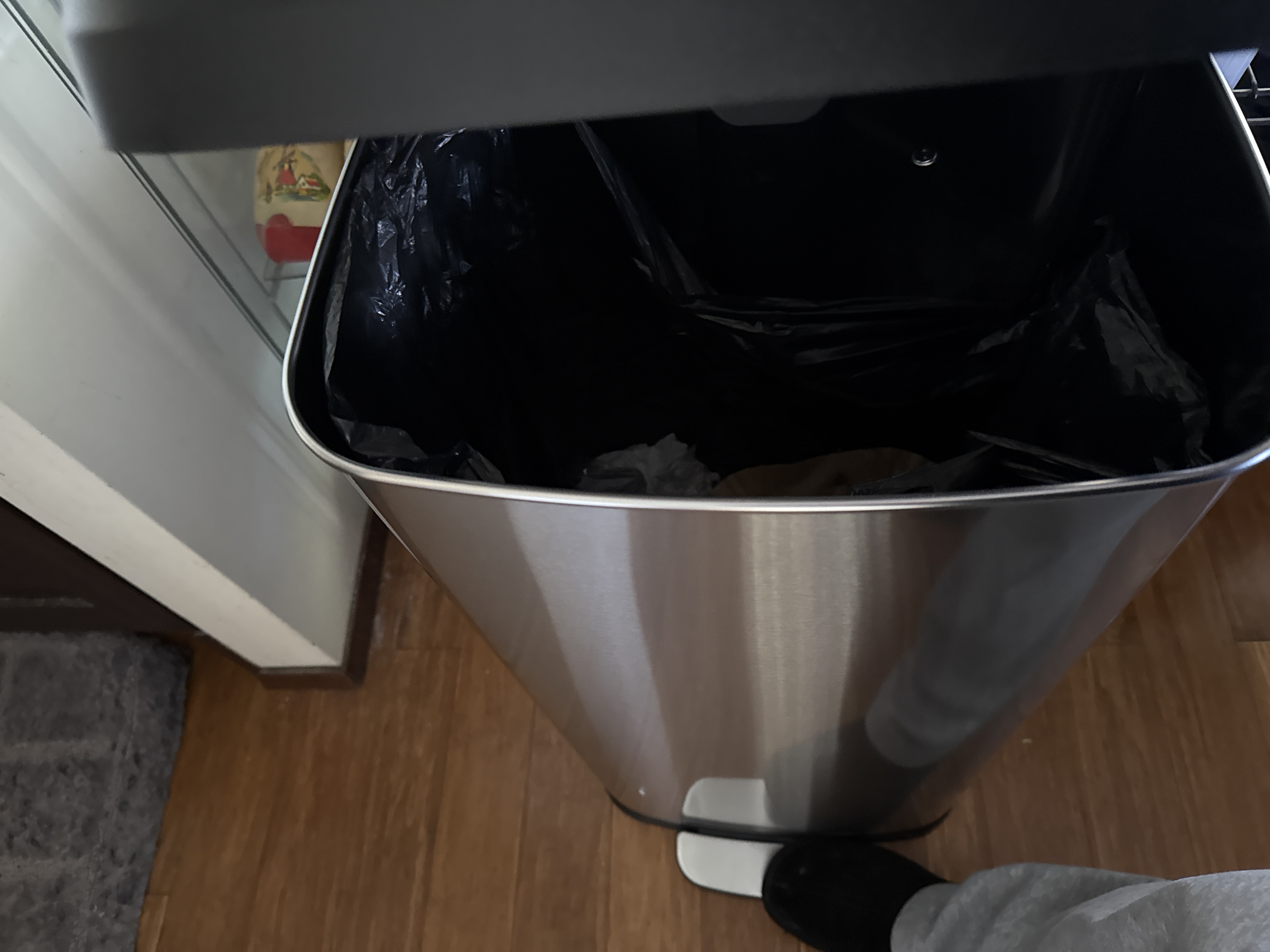 rubish bag slides down