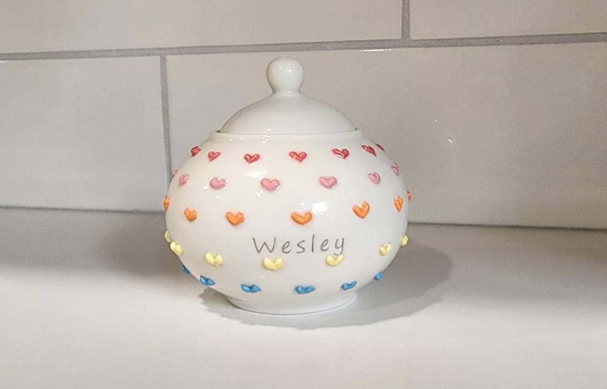 I purchased this item as an urn for my sweet Yorkie-Poo Wesley who recently passed away.