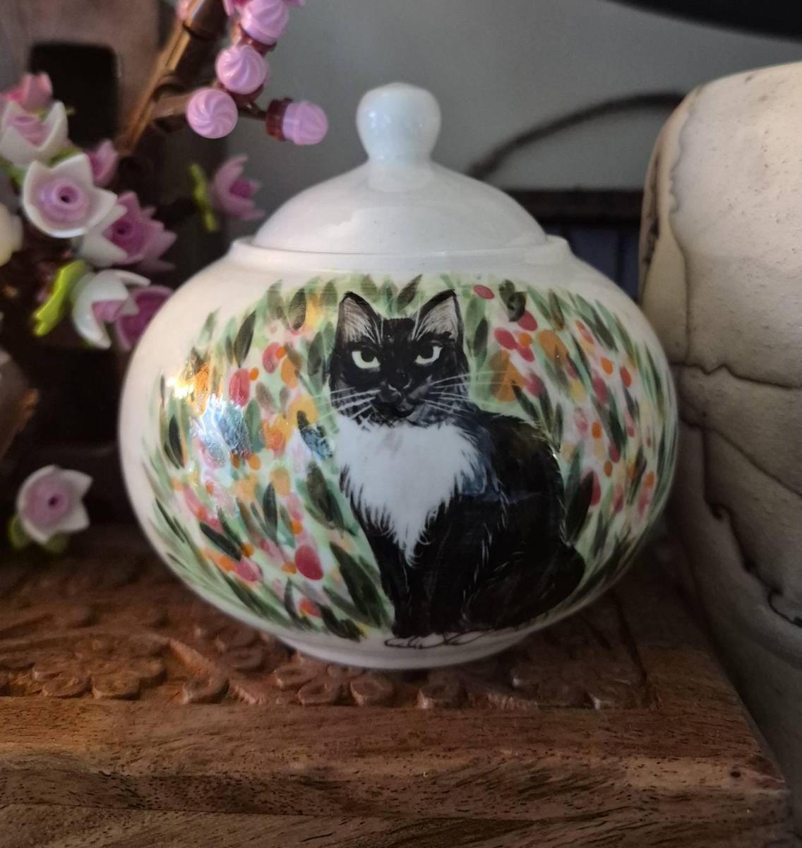 I am so delighted with our two urns.