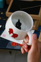 Both mugs are super cute and feel great to hold. Love the little surprise inside
