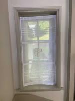 Two curtain panels with monogram