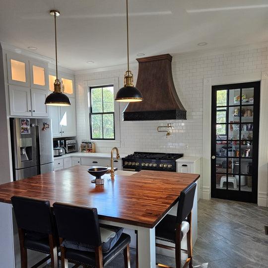 The patina finish adds depth and makes it look like a timeless antique.